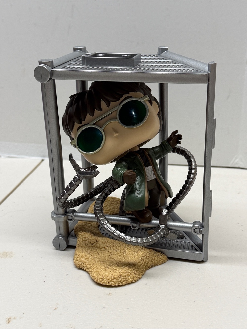 Funko Pop! Doctor Octopus Figure with Silver Arms and Green Coat